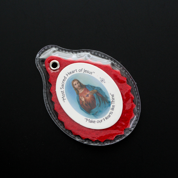 Official Badge of the Sacred Heart League. The badge is enclosed in a clear plastic case for durability and comfort. 