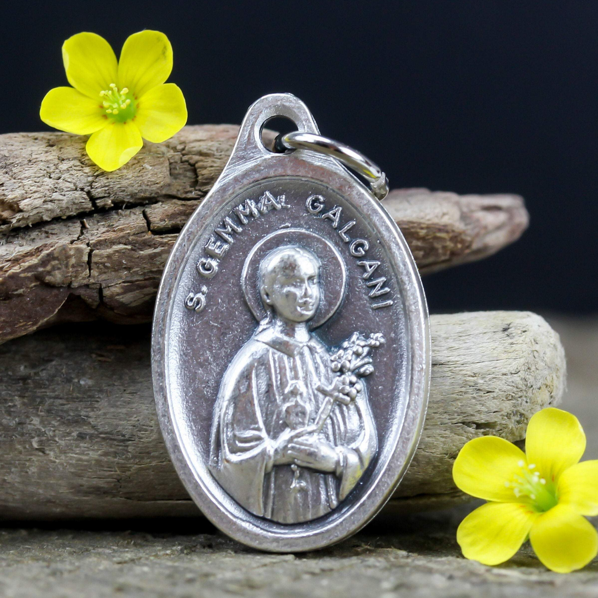 die cast silver medal depicting saint gemma galgani