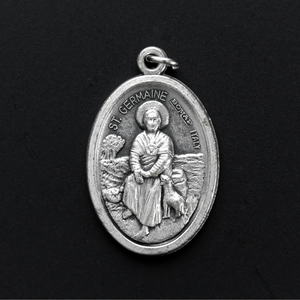 Saint Germaine Cousin patron saint medal, one inch oval oxidized silver