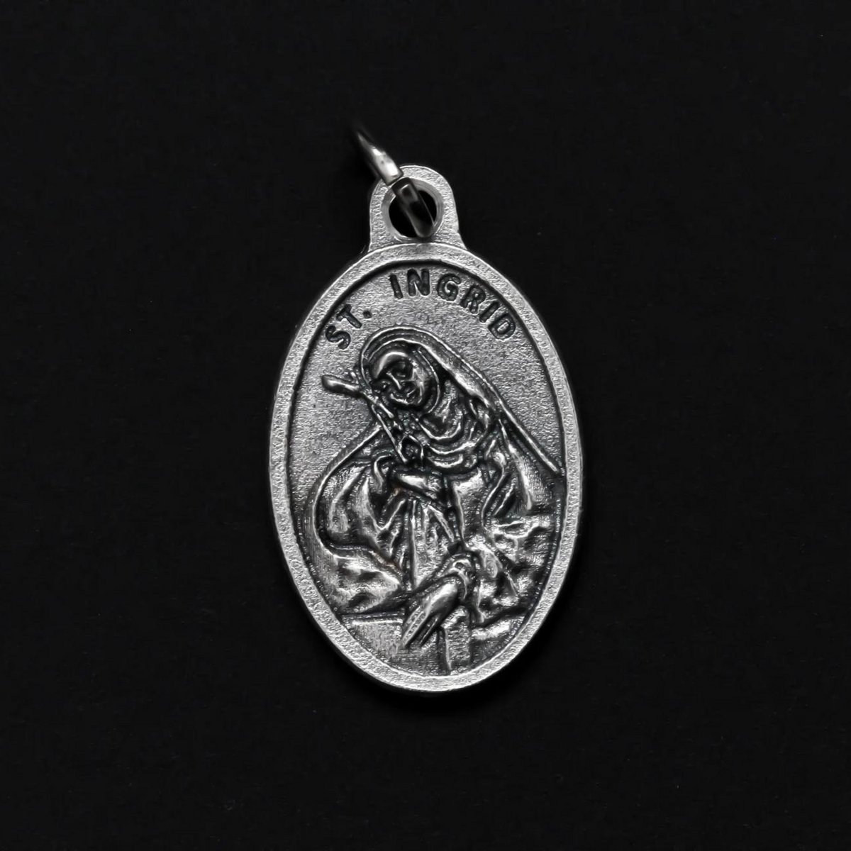 Blessed Ingrid of Sweden medal that depicts the saint on the front and "Pray For Us" on the back. 