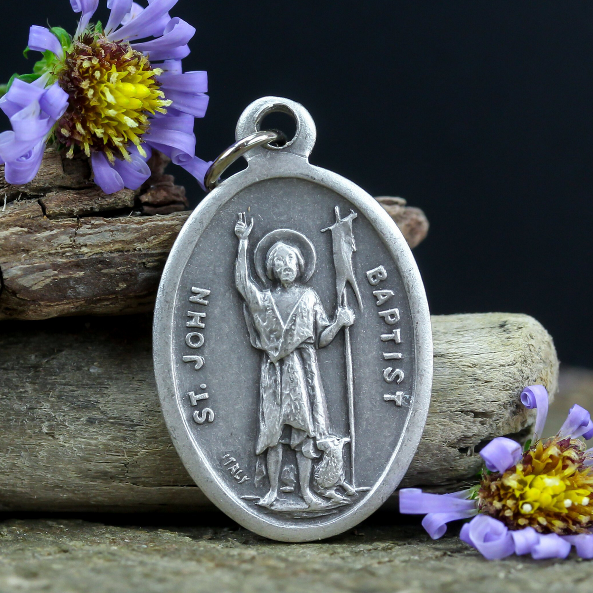 die cast silver medal depicting patron saint john the baptist
