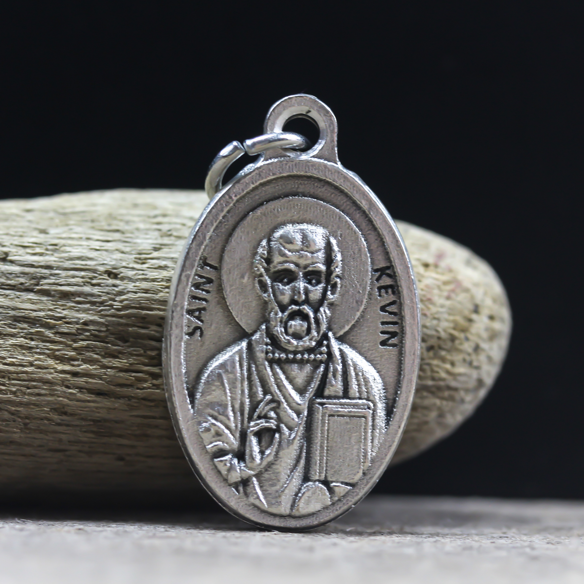 saint kevin one inch oval silver oxidized medal