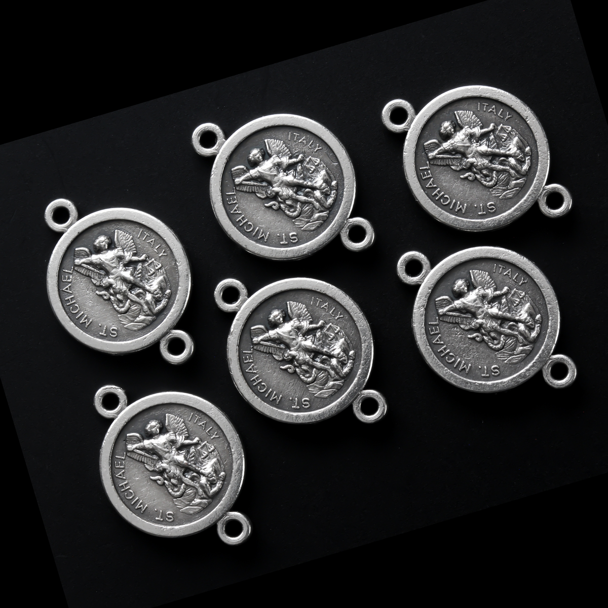 Saint Michael and Guardian Angel jewelry connector links that are oxidized silver-plate base metal made in Italy