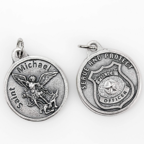 front and back view of die cast patron saint michael medal