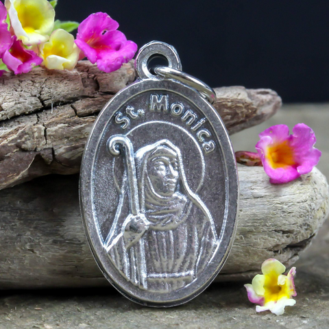 saint monica die cast silver tone one inch oval medal