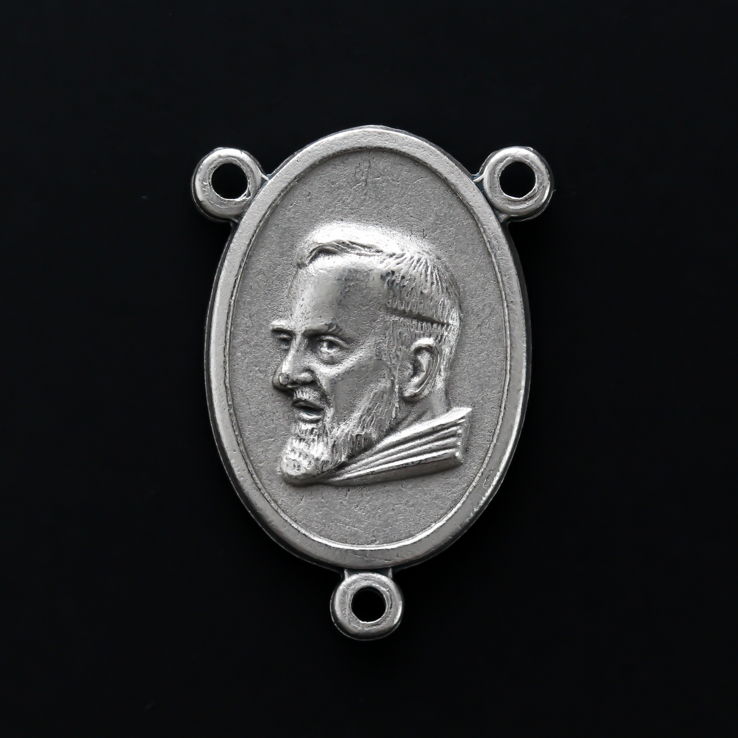 Saint Padre Pio rosary centerpiece that depicts San Pio on the front. There is a third-class Blessed Relic of Padre Pio on the back of the rosary.