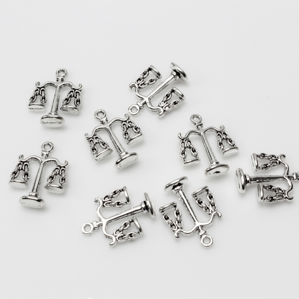 Scale of Justice charms in an antiqued silver tone color, 22mm long