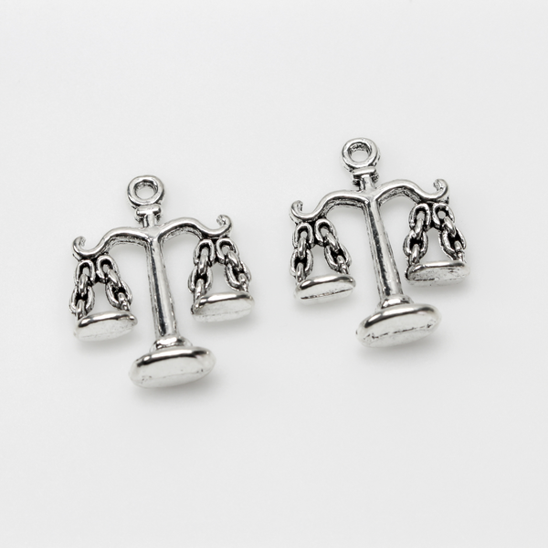 Scale of Justice charms in an antiqued silver tone color, 22mm long