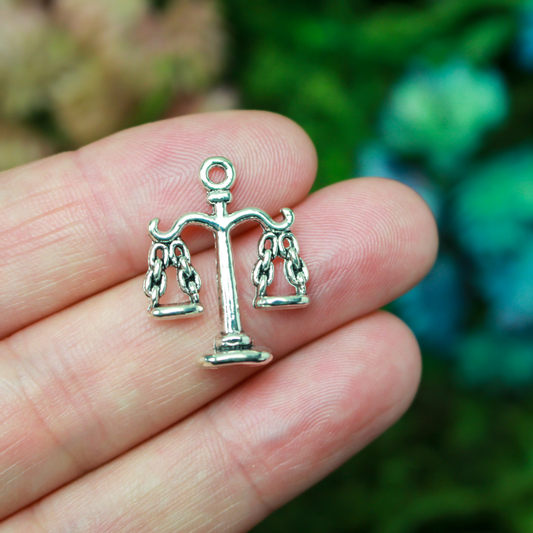 Scale of Justice charms in an antiqued silver tone color, 22mm long