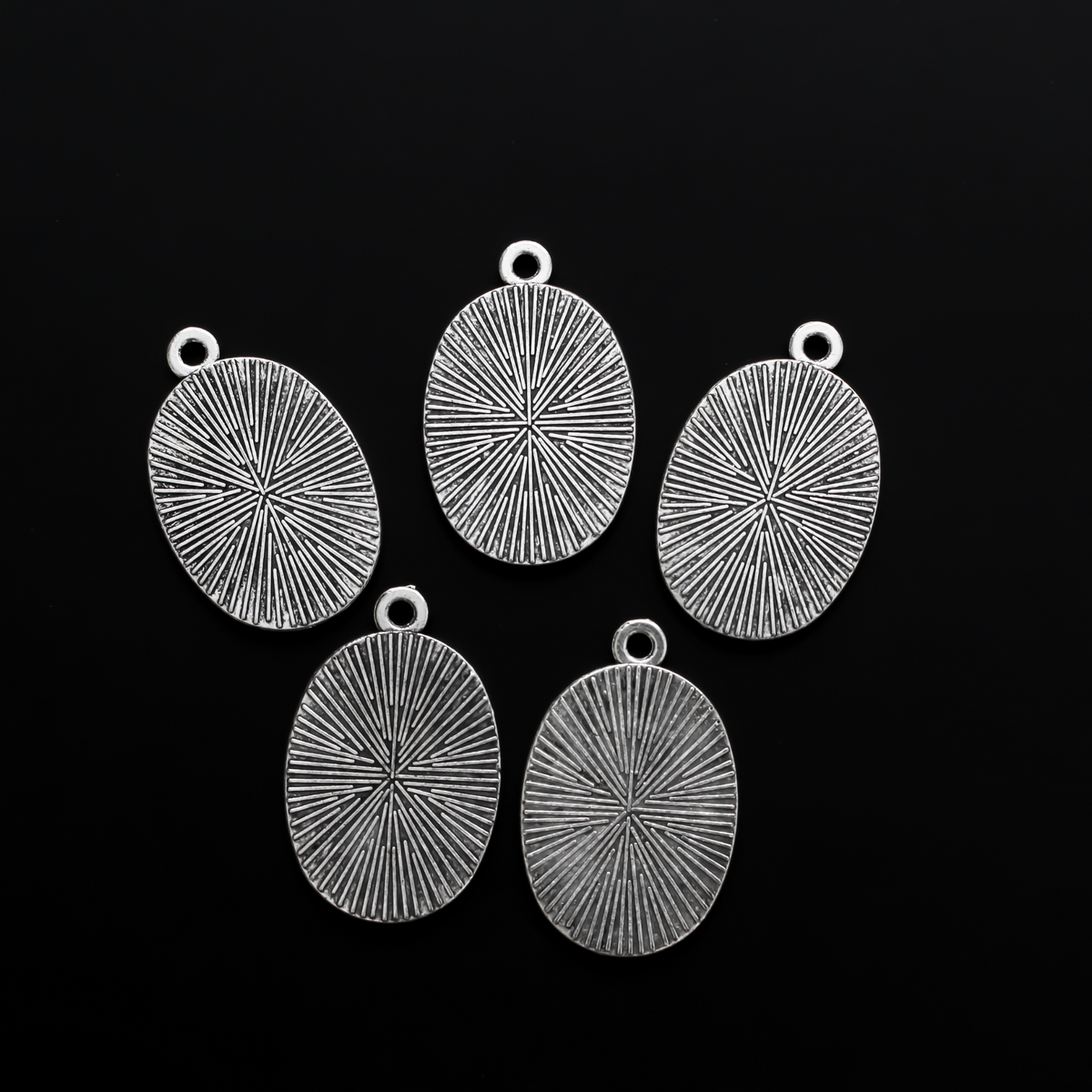 Flat oval pendant cabochon setting in an antiqued silver tone color. This is a plain edge bezel cup with a 25mm x 18mm tray