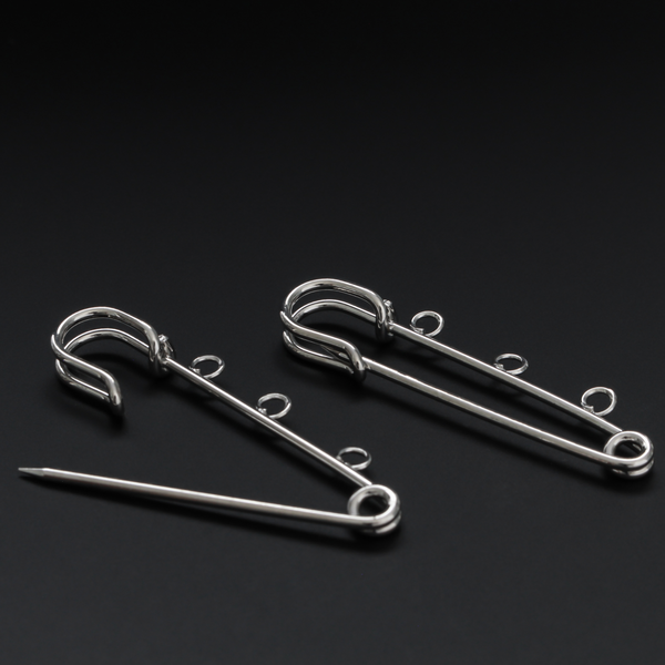 Safety pin brooch pin with three loops so you can easily attach your patron saint medals.