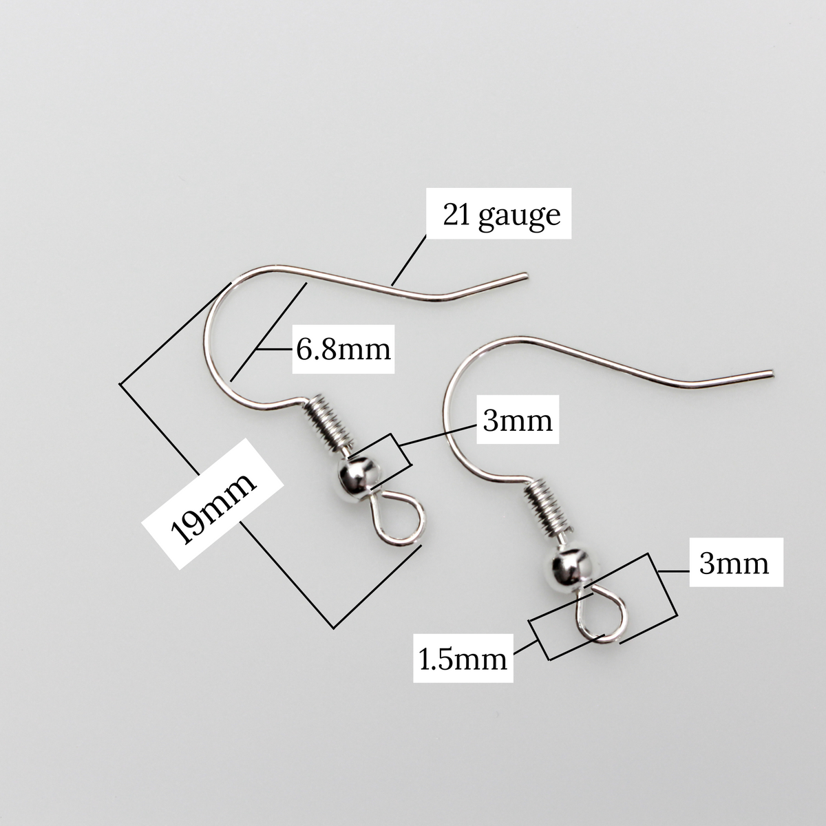 earring hooks with a horizontal loop and a shiny platinum silver finish, 23 gauge wire. Sold in packages of 30 hooks (15 pairs)