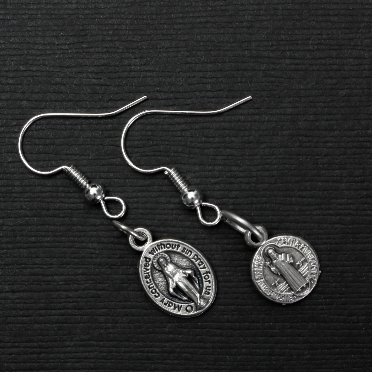 earring hooks with a horizontal loop and a shiny platinum silver finish, 23 gauge wire. Sold in packages of 30 hooks (15 pairs)