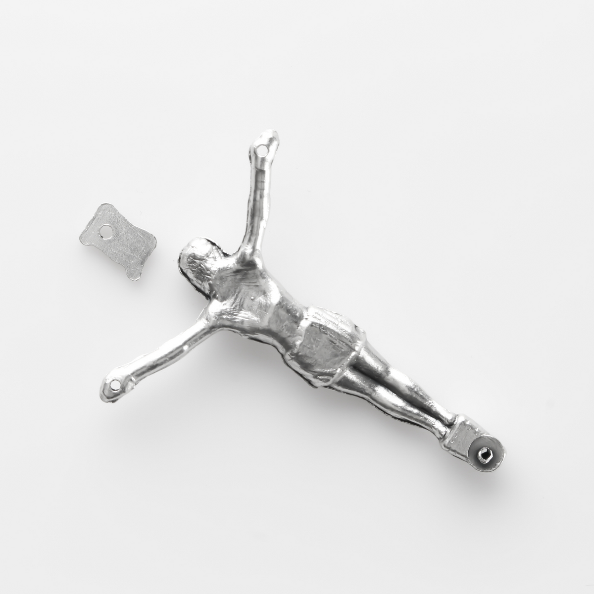 1.625" long corpus that comes with an INRI scroll that can be attached to a cross using the pre-drilled 2mm holes
