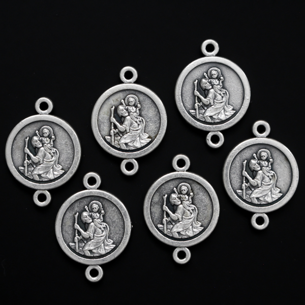 Saint Christopher round flat connector links that are silver oxidized plating on a base metal.