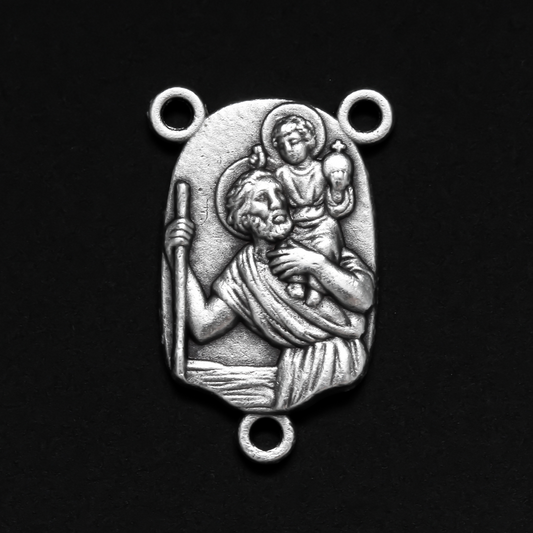 Rosary centerpiece that depicts St. Christopher with child Jesus on his shoulders on the front, the reverse is marked "Pray For Us"