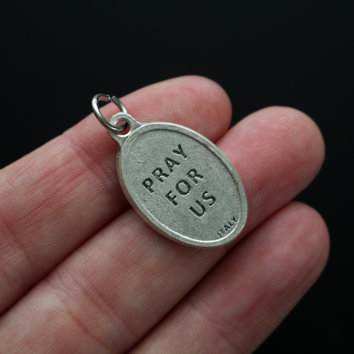 Saint Eugène de Mazenod medal that depicts the saint on the front and "Pray For Us" on the backside.