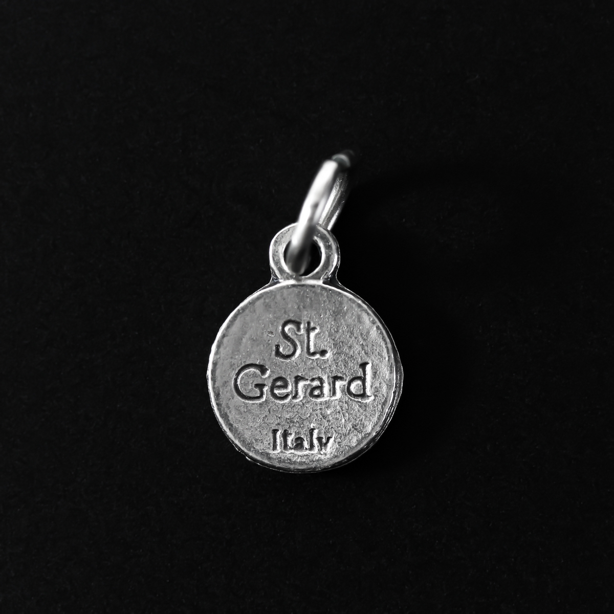 St. Gerard Majella medal that is silver plated and small in size, perfect for a bracelet or a dainty necklace.