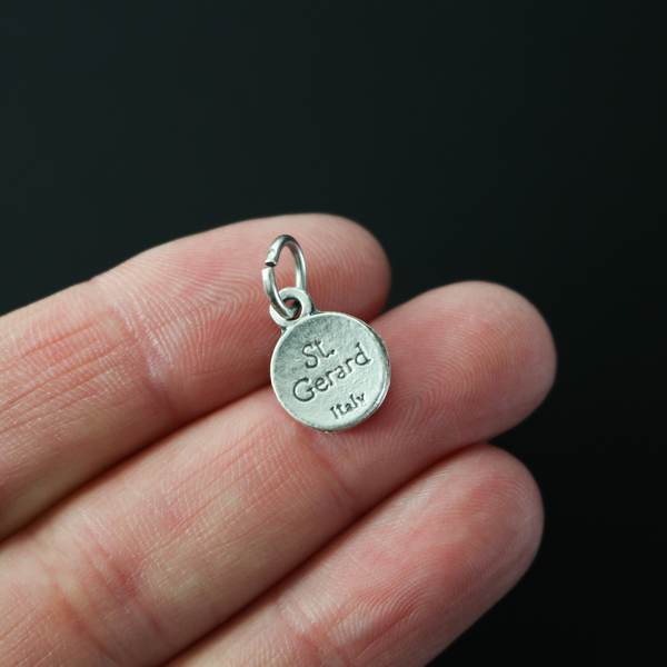 St. Gerard Majella medal that is silver plated and small in size, perfect for a bracelet or a dainty necklace.