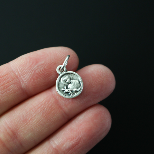 St. Gerard Majella medal that is silver plated and small in size, perfect for a bracelet or a dainty necklace.