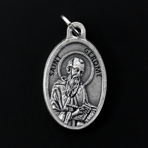 Saint Gerome (Jerome) medal that depicts the saint on the front and the reverse is marked "Pray For Us". 