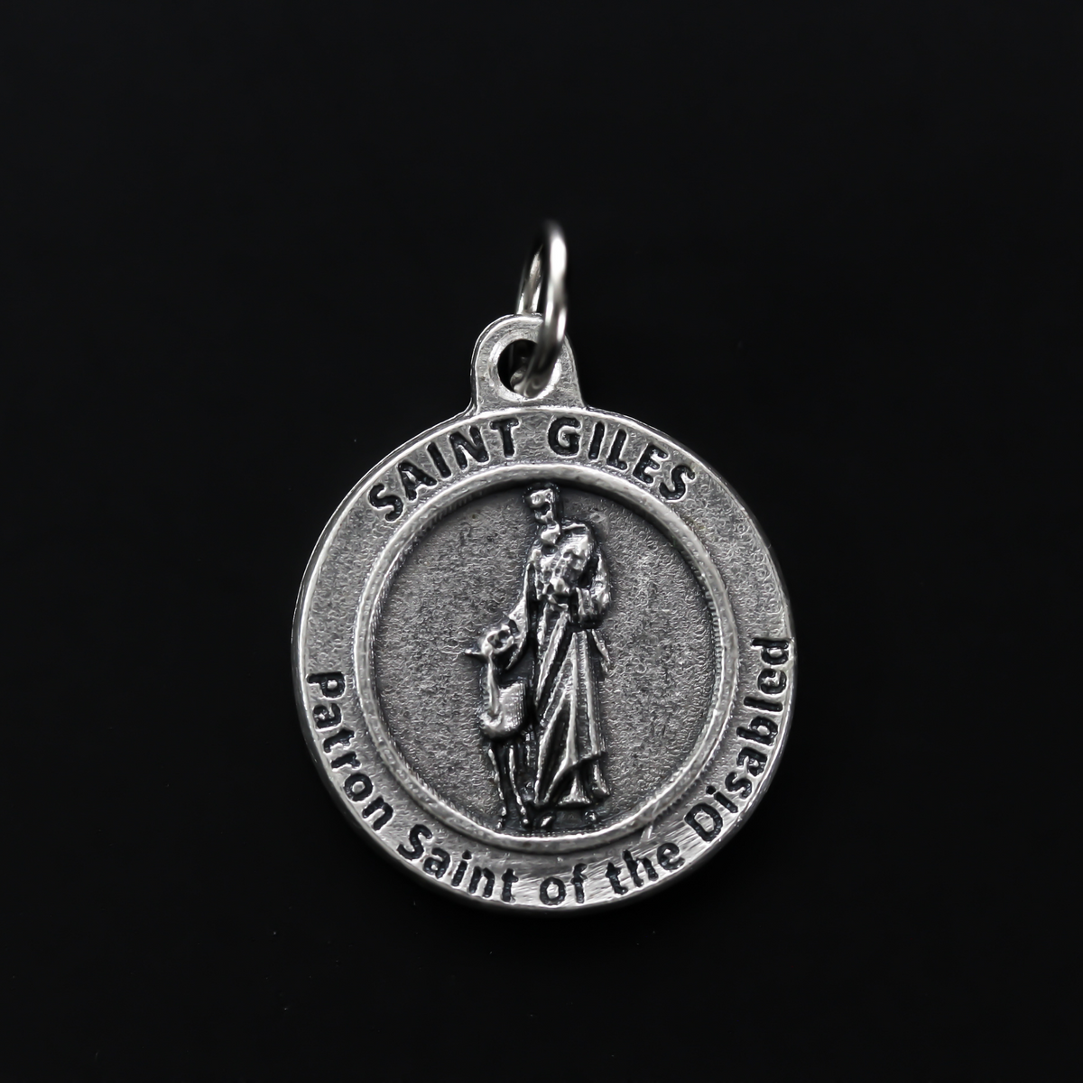 Saint Giles 3/4" round medal. The front depicts the saint and the reverse is marked "Patron Saint of the Disabled".