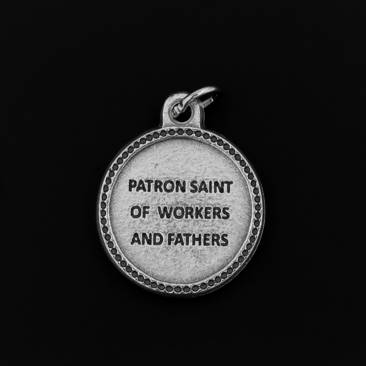 Saint Joseph medal that is round in shape