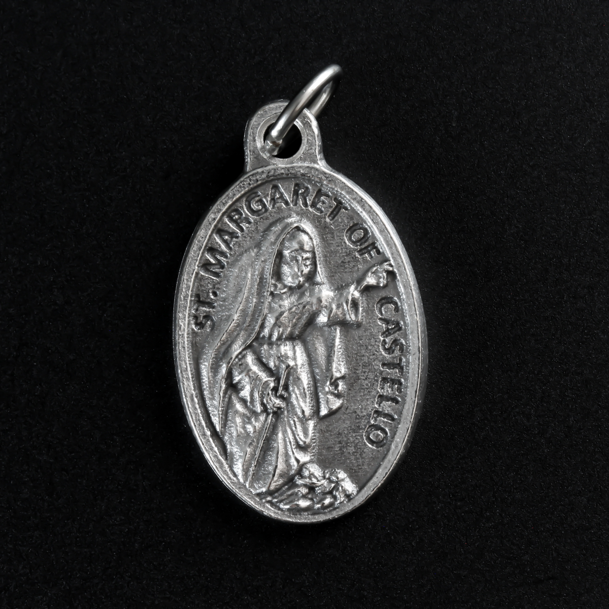 Saint Margaret of Castello medal that depicts the saint on the front and "Pray For Us" on the back