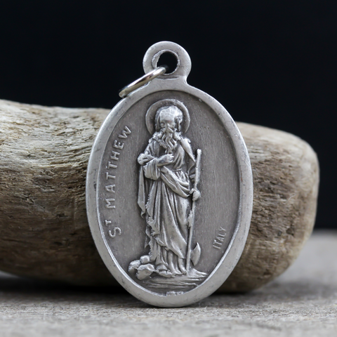 saint matthew the apostle pray for us religious medal. silver tone color 1" oval medallion