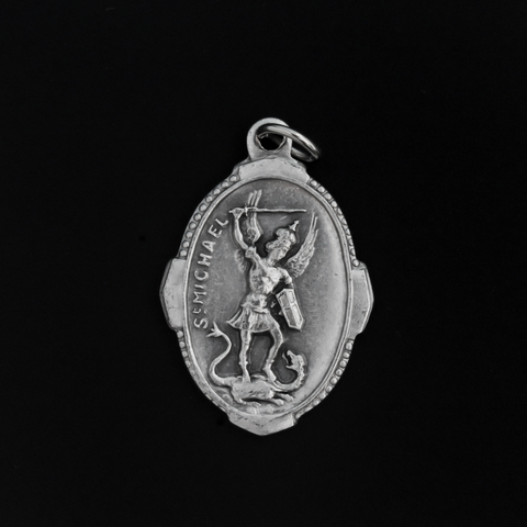 Saint Michael deluxe ornate medal. The front depicts St. Michael, the warrior angel of protection and the reverse is marked "Pray For Us". 