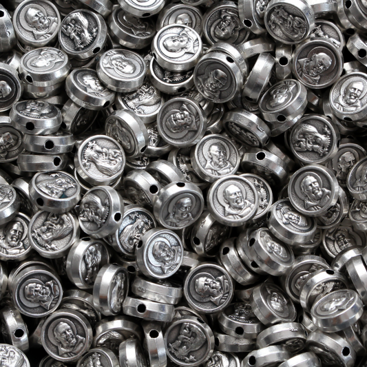 Metal spacer beads that depict Saint Padre Pio on one side and Our Lady of Perpetual Help on the other side.