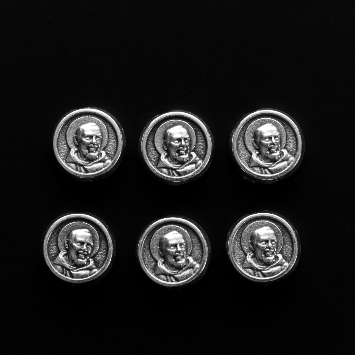 Metal spacer beads that depict Saint Padre Pio on one side and Our Lady of Perpetual Help on the other side.