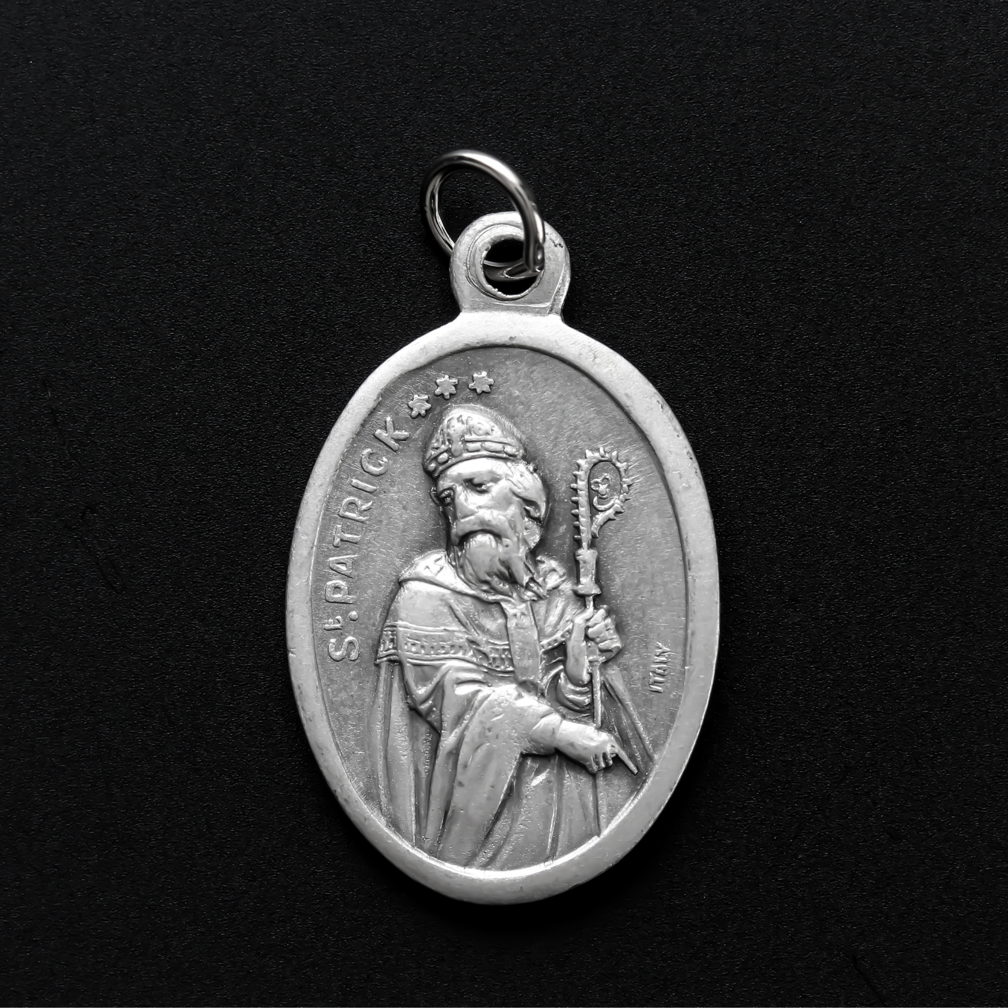 die cast silver medal depicting patron saint patrick of ireland