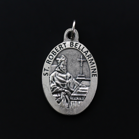 Saint Robert Bellarmine medal that depicts the saint on the front and is marked "Pray For Us" on the back.