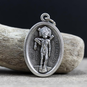 saint sebastian silver oxidized one inch oval medal