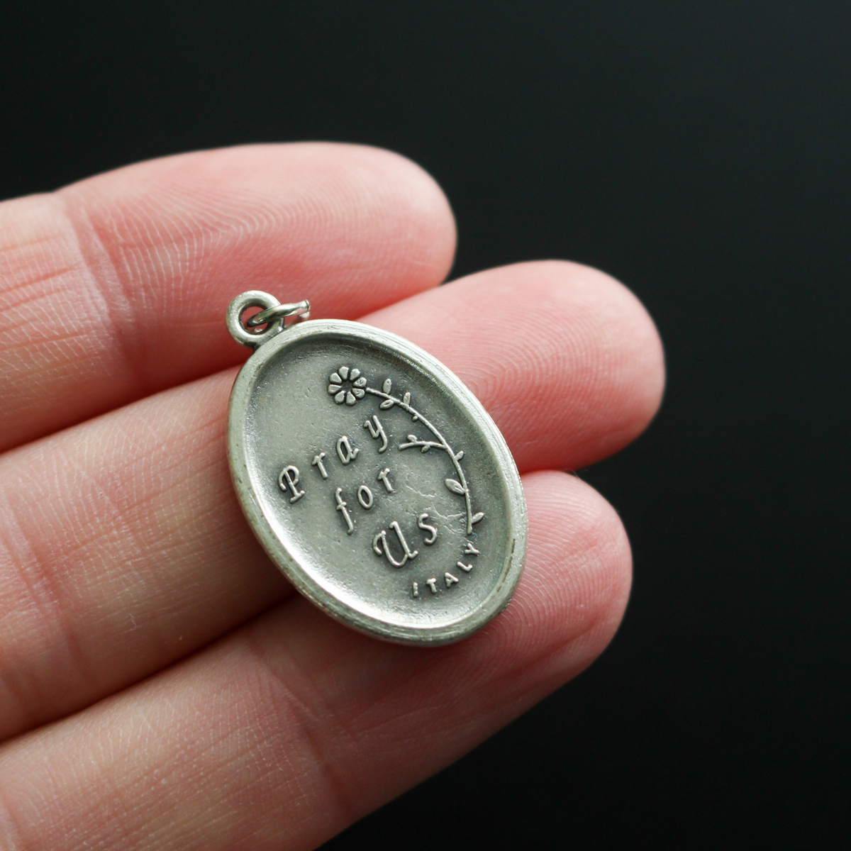 Saint Servatius medal. The front depicts the saint and the reverse side is marked "Pray For Us"