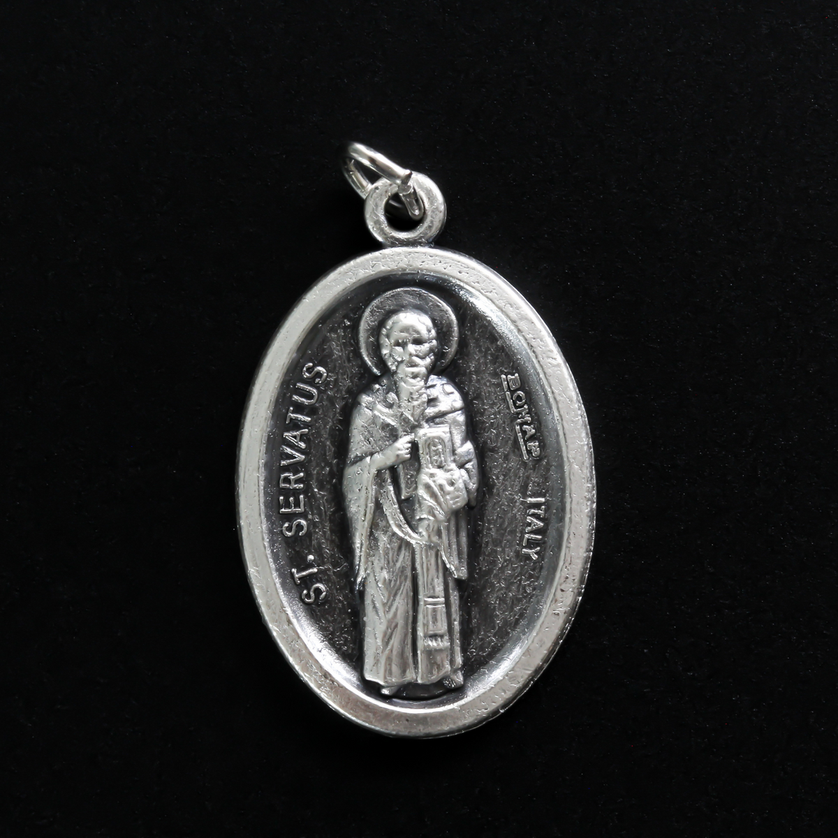 Saint Servatius medal. The front depicts the saint and the reverse side is marked "Pray For Us"