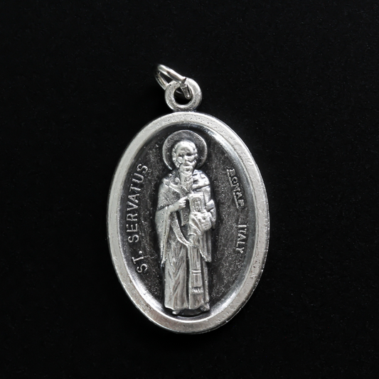 Saint Servatius medal. The front depicts the saint and the reverse side is marked "Pray For Us"