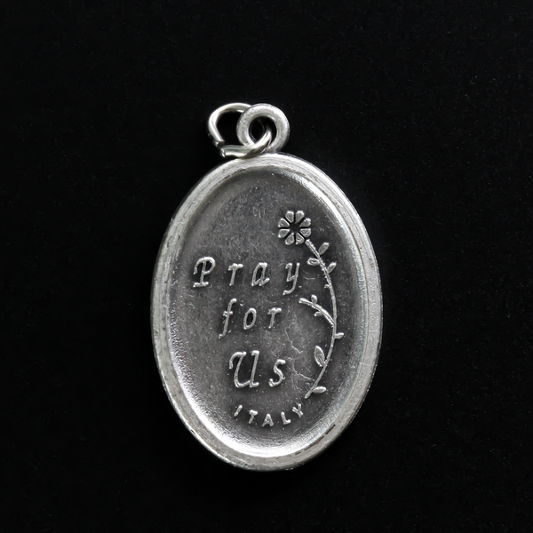 Saint Servatius medal. The front depicts the saint and the reverse side is marked "Pray For Us"
