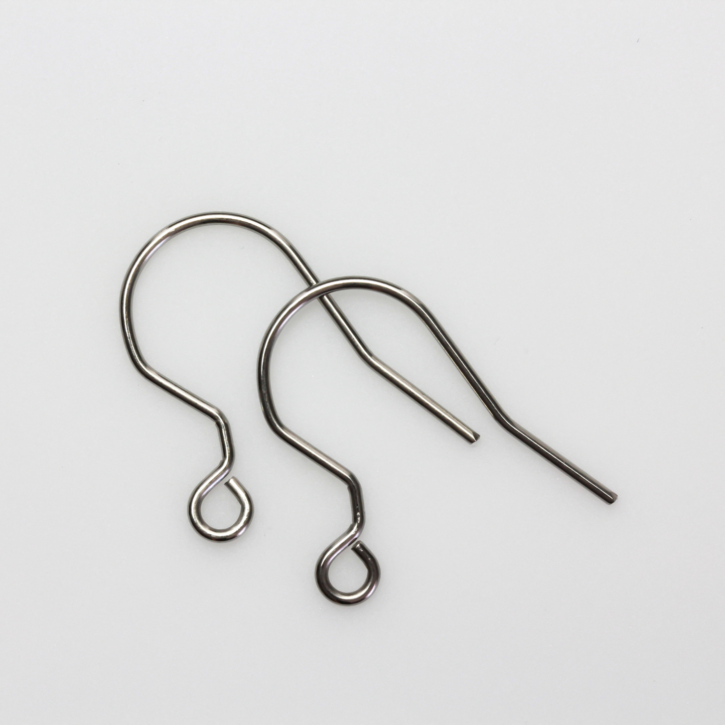 304 Stainless steel earring hooks with a horizontal loop, 20 guage wire. Sold in packages of 30 hooks (15 pairs).