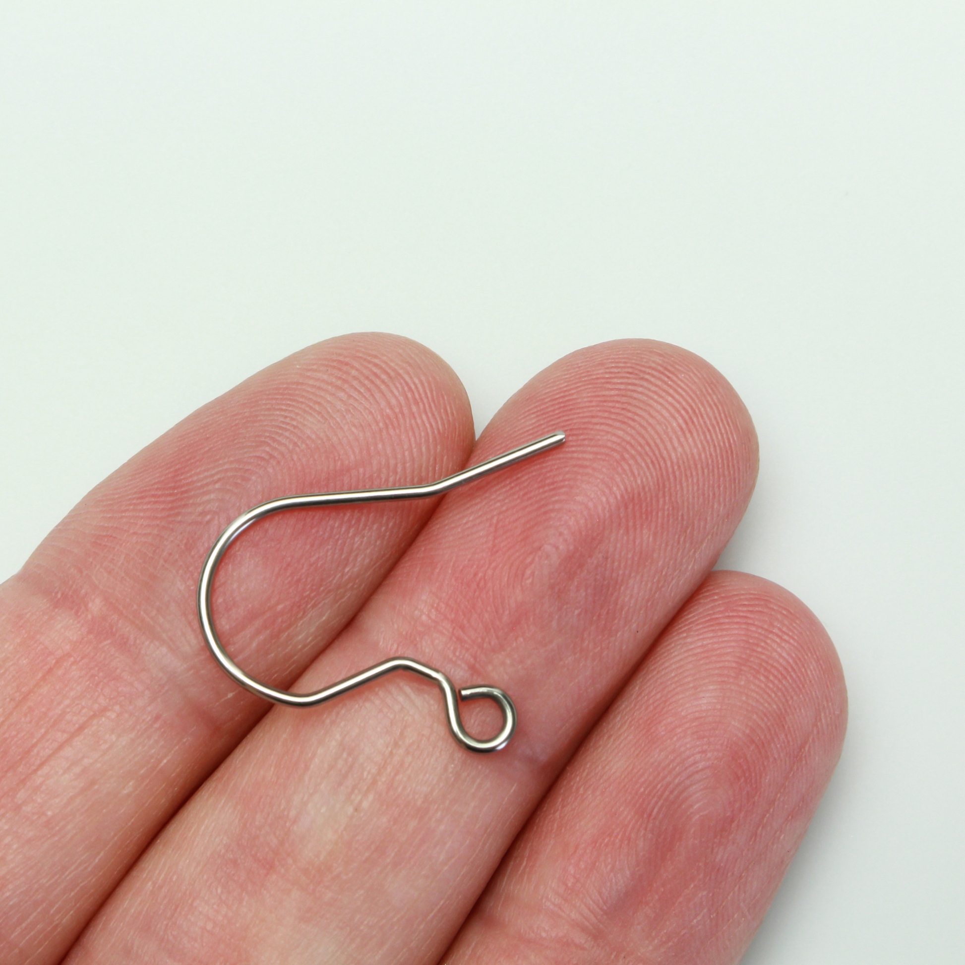 304 Stainless steel earring hooks with a horizontal loop, 20 guage wire. Sold in packages of 30 hooks (15 pairs).