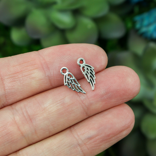 tiny filigree angel wing charms