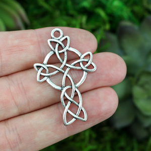 silver tone celtic trinity cross with cutout design