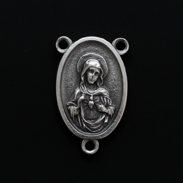 One inch oval rosary centerpiece that features an image of The Immaculate Heart of Mary on the front with an image of The Sacred Heart of Jesus on the back
