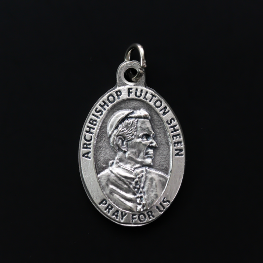 Archbishop Fulton Sheen medal that has one of his quotes on the backside "To do God's will until death, that is the inner heart of all holiness"