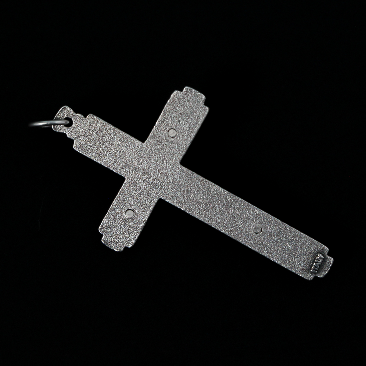 This detailed crucifix was made in Italy and has a sunburst nimbus detail behind the head of Jesus. 