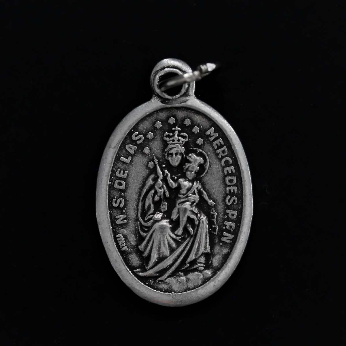 Virgin of Mercy medal that depicts Our Lady on the front and is marked "Pray For Us" on the back