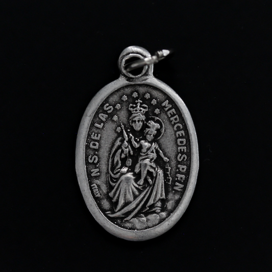 Virgin of Mercy medal that depicts Our Lady on the front and is marked "Pray For Us" on the back