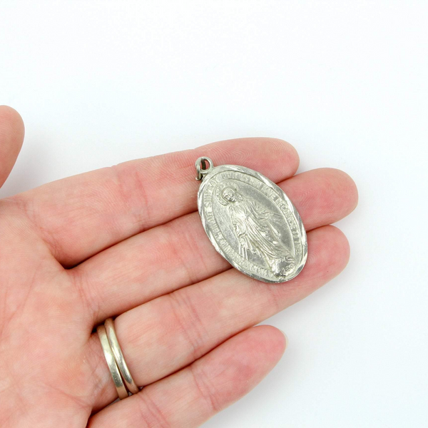 silver-tone midcentury miraculous medal made in japan
