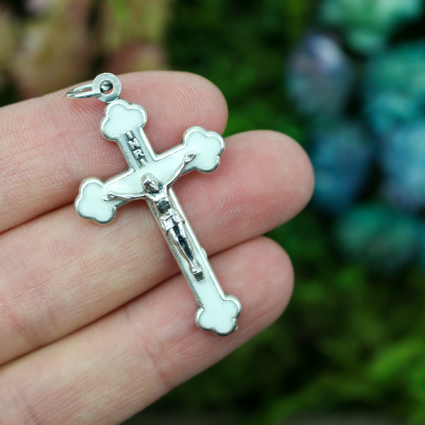 Orthodox Byzantine die-cast metal crucifix with a pearlized white enamel inlay